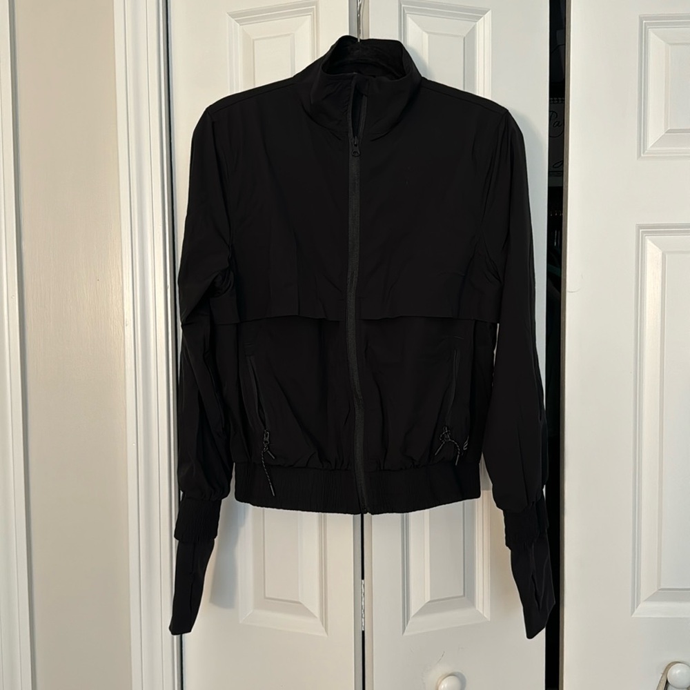 Ptula black sweat jacket. Size large.